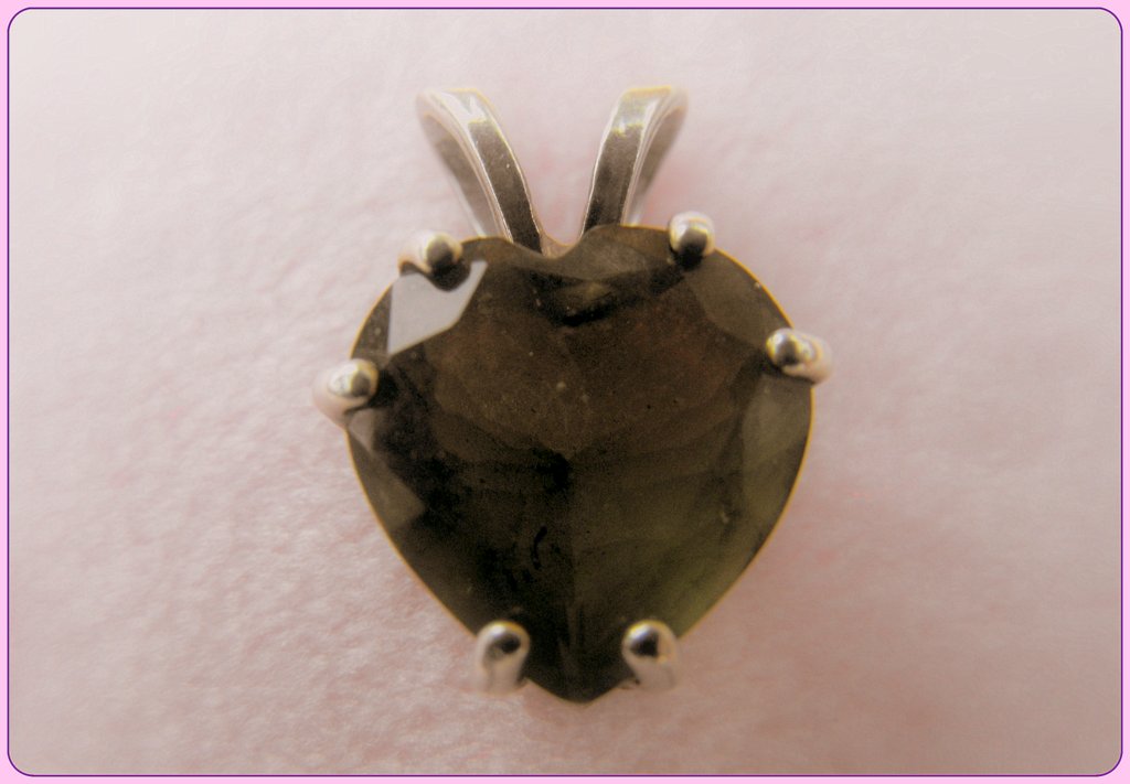 a moldavite heart pendant
