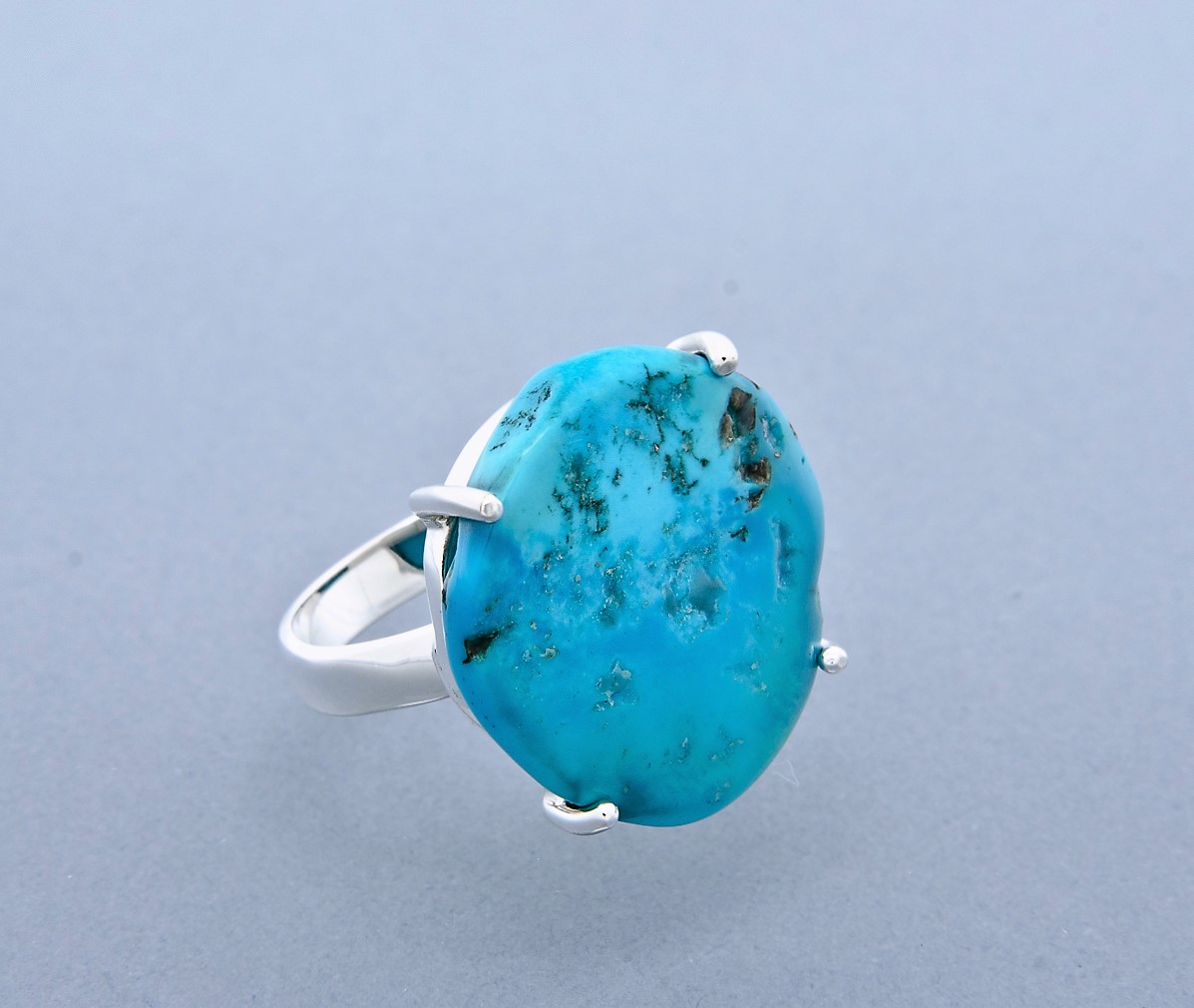 Turquoise claw set ring