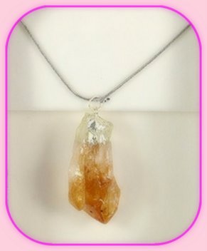 Rough Citrine Point Pendant approximately 3 x 2 cm; Length of the chain is 60 cm.