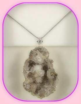 Rough Half Geode Mineral Pendant approximately 3 x 2 cm; Length of the chain is 60 cm